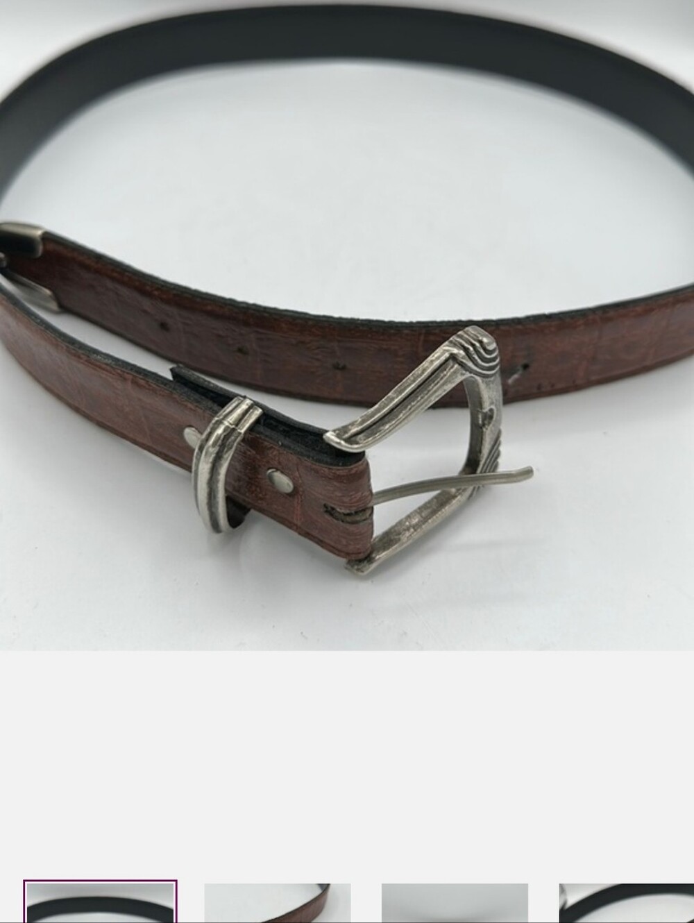 Brown belt with silver buckle